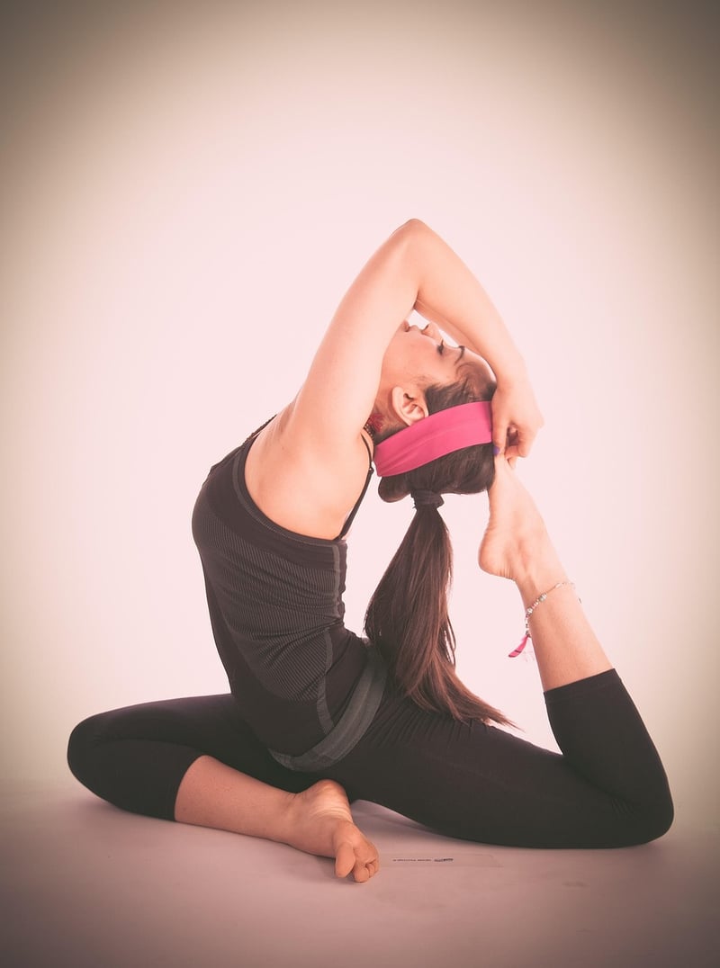 Woman practicing yoga for health and fitness